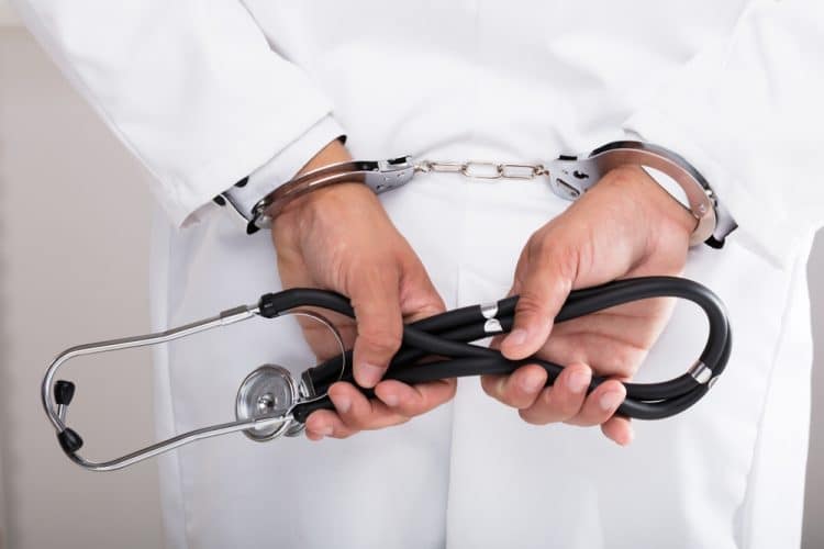 A Handcuffed Doctor.